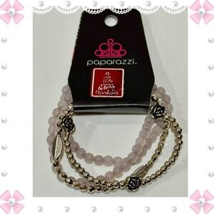 Bracelets - Paparazzi - set of 4 pink and silver colored beads. Elastic.  New!